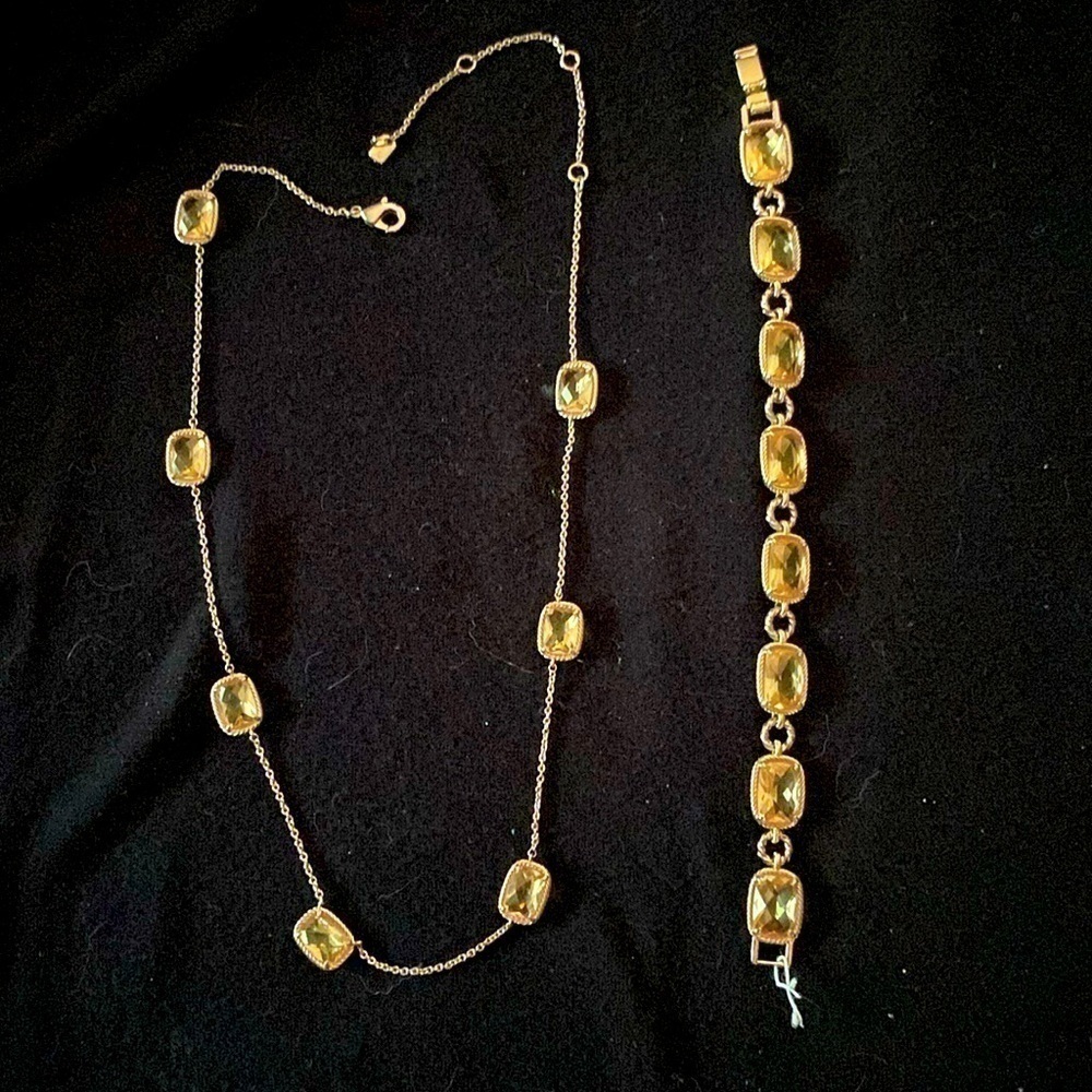 Gold stone necklace and matching bracelet by Ralph Lauren.……‍‍‍‍